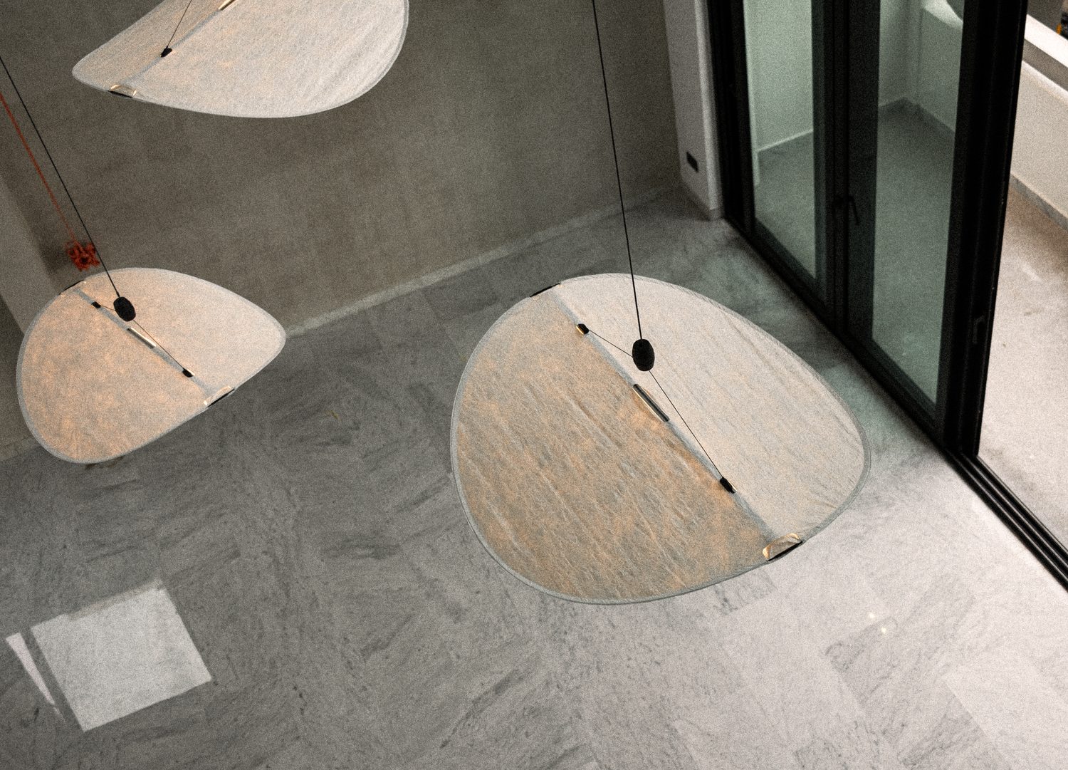 Looking down on the void — the pendants and the stone floor from above
